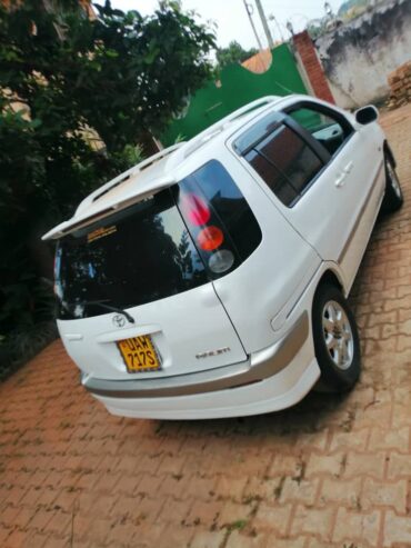 Toyota raum uaw white