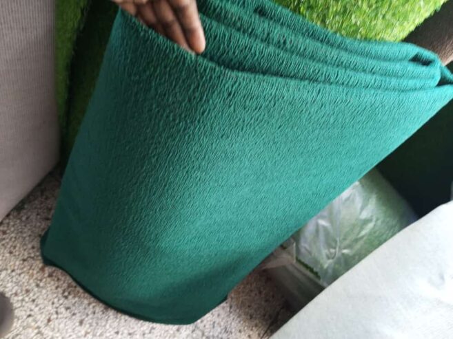 Green woollen carpet