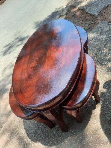 Coffee table with four stools